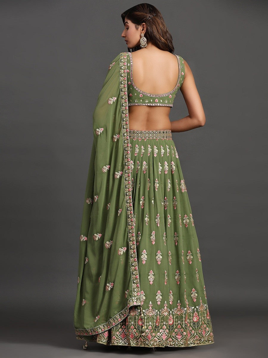 Model posing in Elegant Green Georgette Party Look Lehenga Choli, demonstrating the stylish and graceful fit.