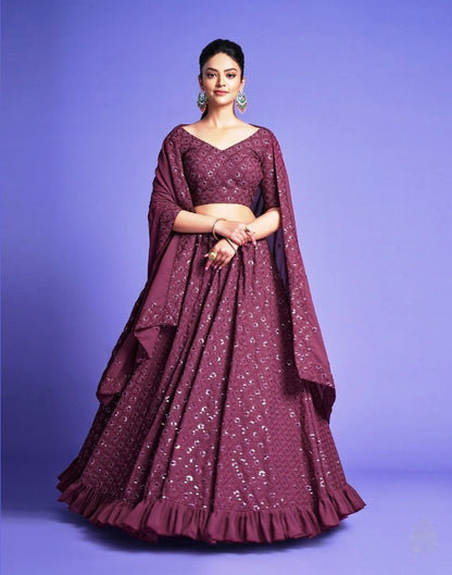 Model posing in Exquisite Rose Wood Diamond Georgette Thread Worked Lehenga, demonstrating the stylish and graceful fit.