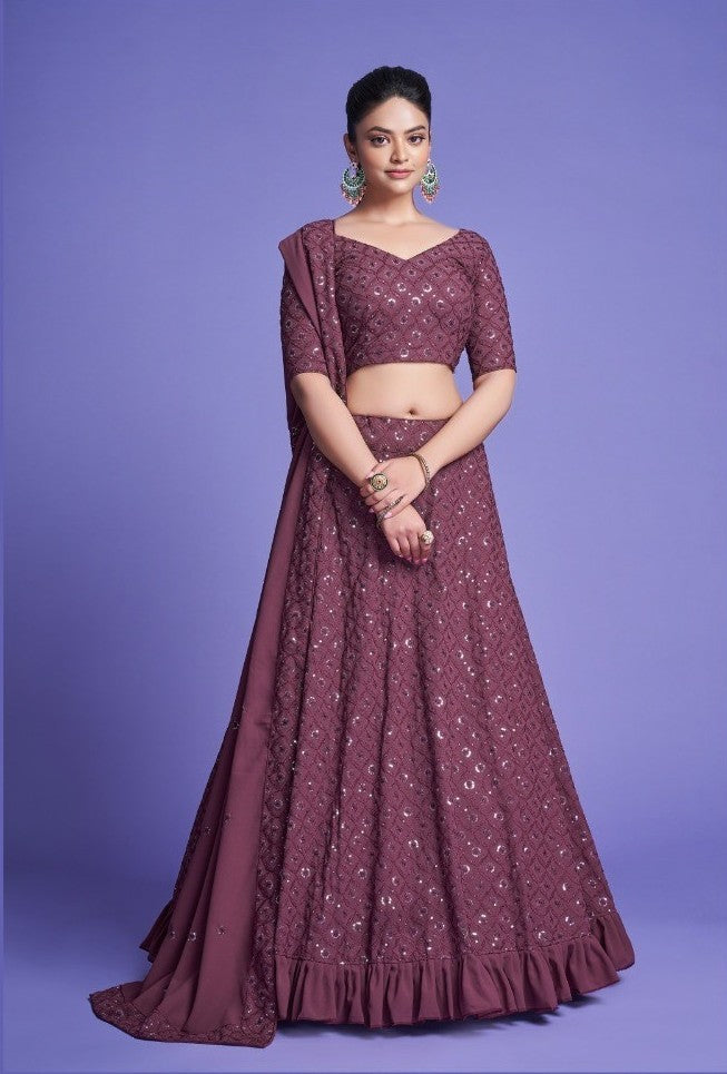 Model posing in Exquisite Rose Wood Diamond Georgette Thread Worked Lehenga, demonstrating the stylish and graceful fit.