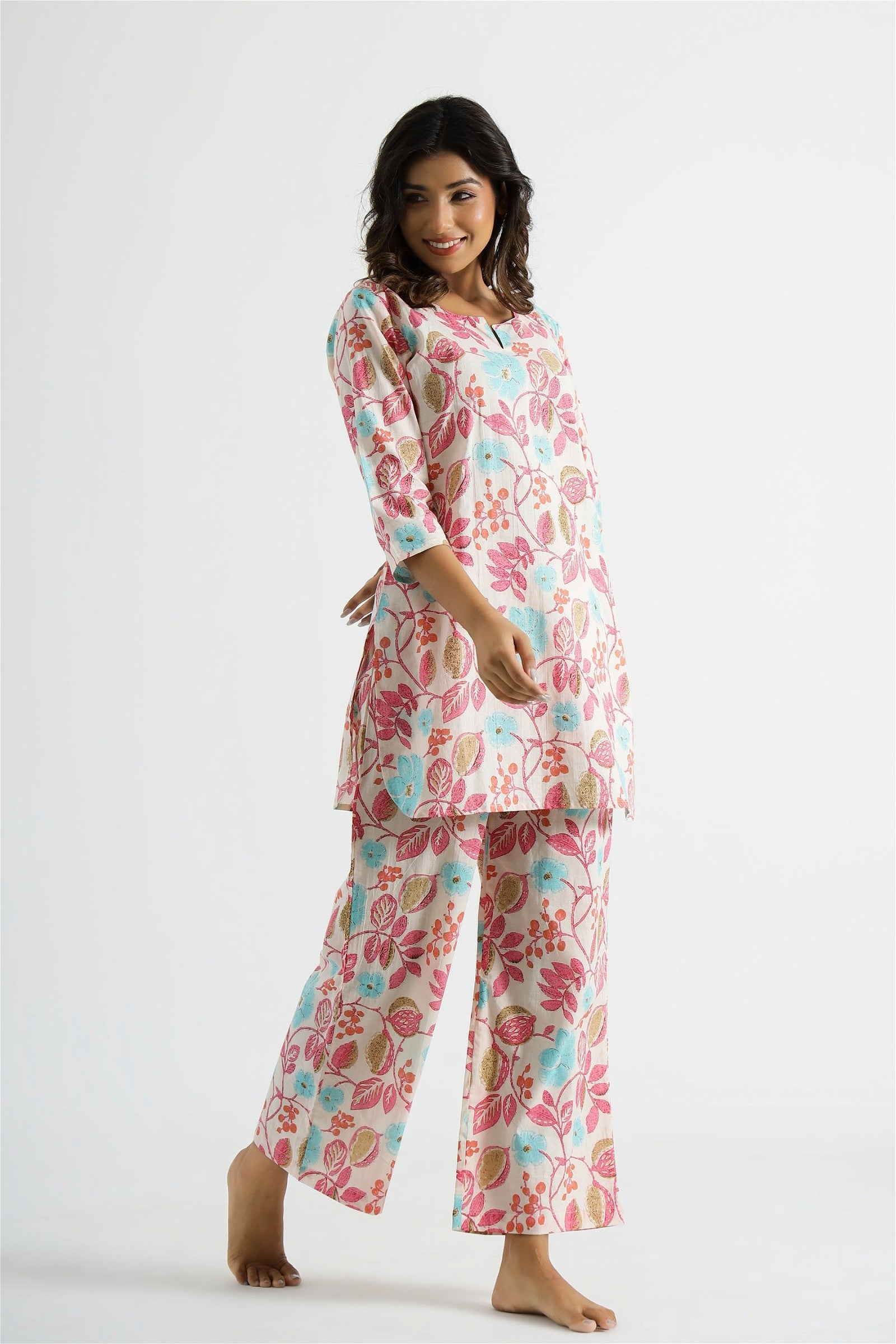 Woman wearing Floral Printed Pink Designer Co-ord Set, showcasing the stylish top and matching bottoms - Let Us Vogue