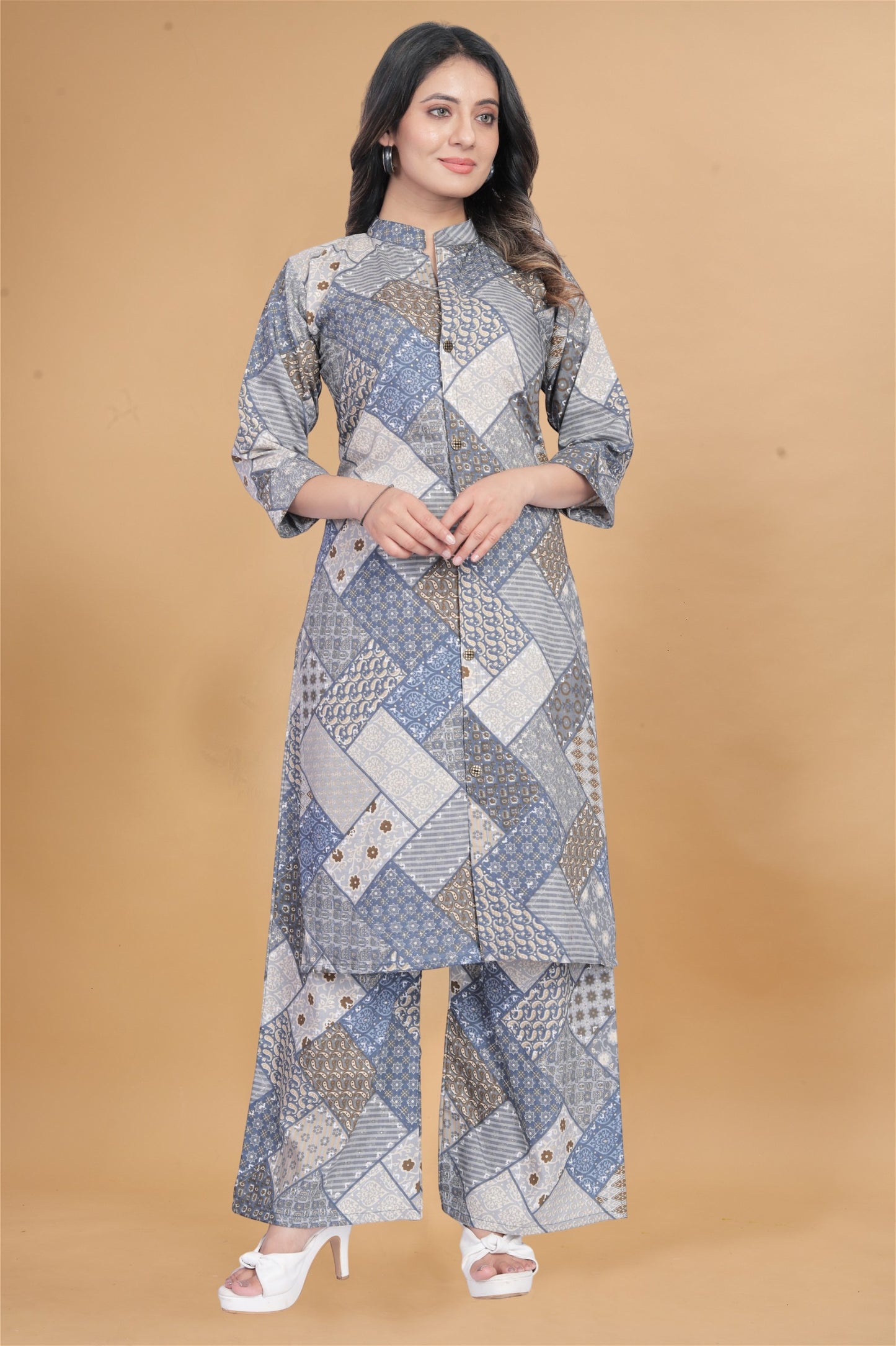 Model posing in Stylish Grey Muslin Printed Women's Kurti and Palazzo Set, demonstrating the stylish and comfortable fit.