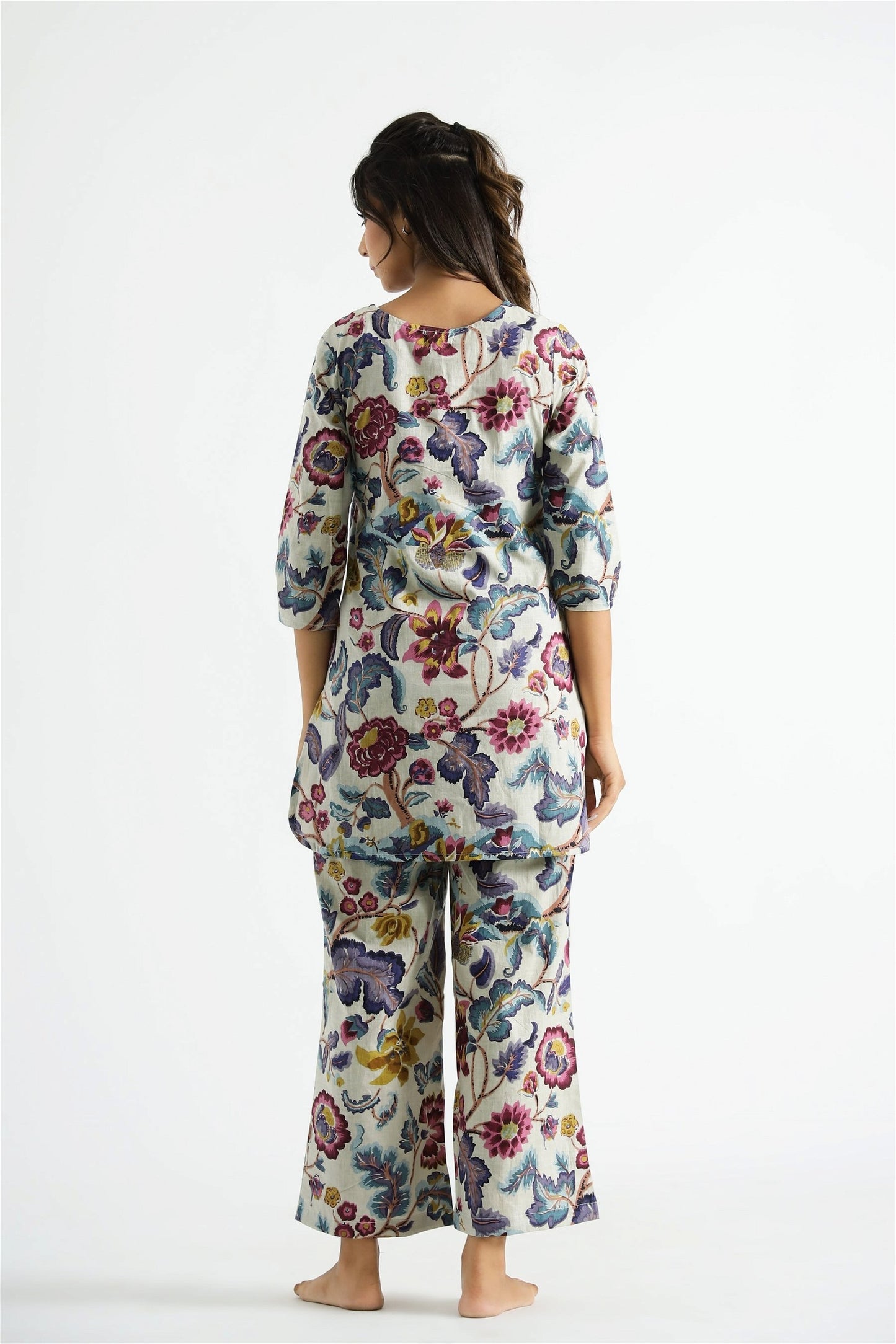 Model posing in Chic Multi Colour Cotton Rayon Women's Wear Co-ords Set, demonstrating the stylish and comfortable fit.