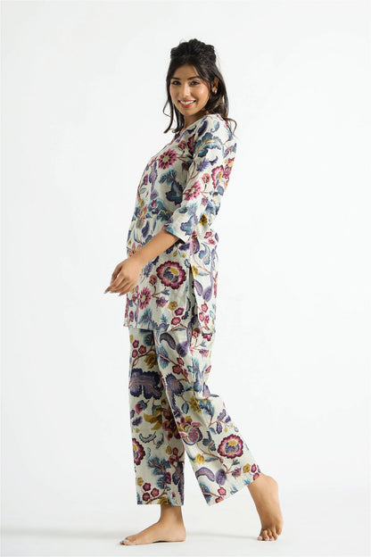 Model posing in Chic Multi Colour Cotton Rayon Women's Wear Co-ords Set, demonstrating the stylish and comfortable fit.