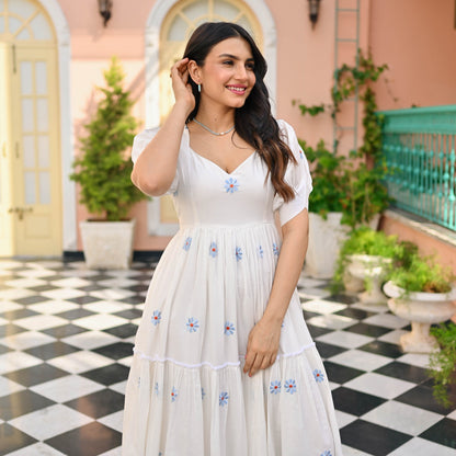 Model posing in Floral Print Embroidered Flaired Gown with Round Flair, demonstrating the flattering fit.