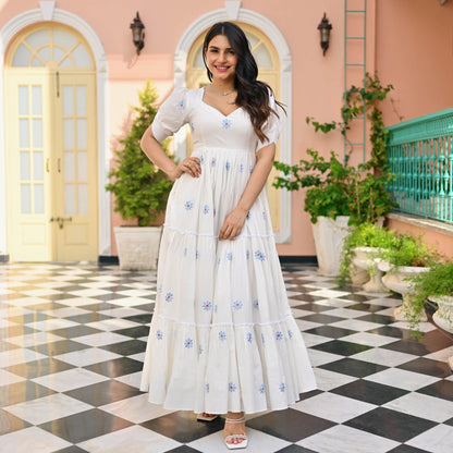 Model posing in Floral Print Embroidered Flaired Gown with Round Flair, demonstrating the flattering fit.