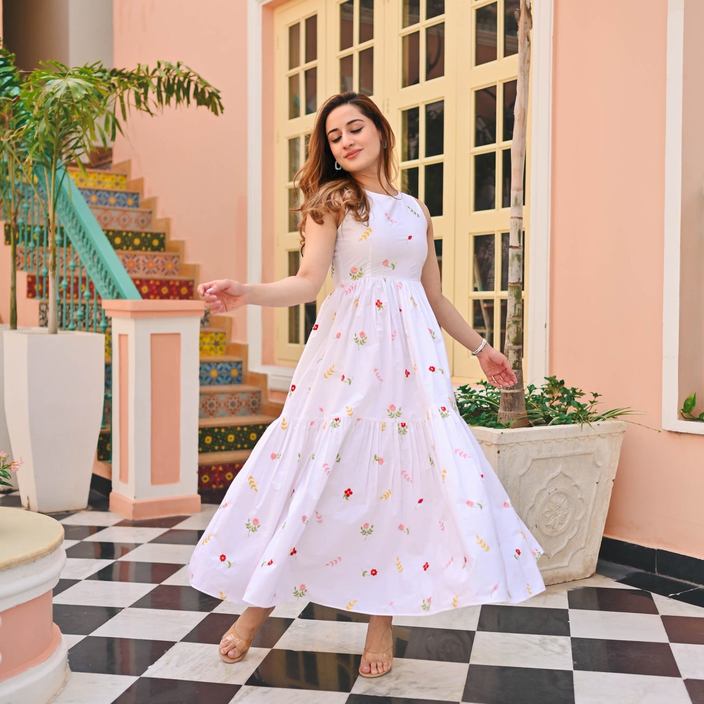 Model posing in Floral Print Flaired Gown with Round Flair, demonstrating the flattering fit.